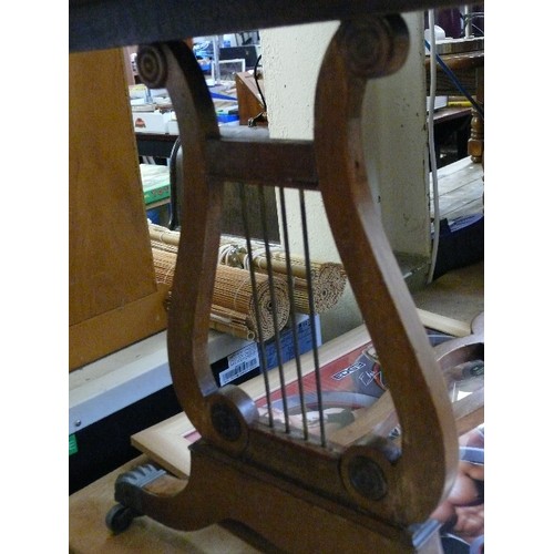 426 - GOOD QUALITY WALNUT VENEERED LYRE END COFFEE TABLE WITH LION PAW FEET