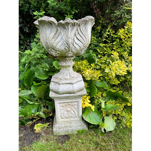 327A - An impressive pair of vintage acanthus urn planters in cast simulated stone, on square plinths. Very... 