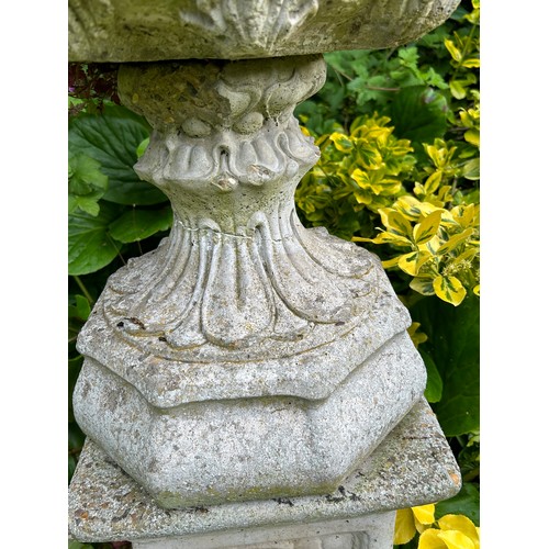 327A - An impressive pair of vintage acanthus urn planters in cast simulated stone, on square plinths. Very... 