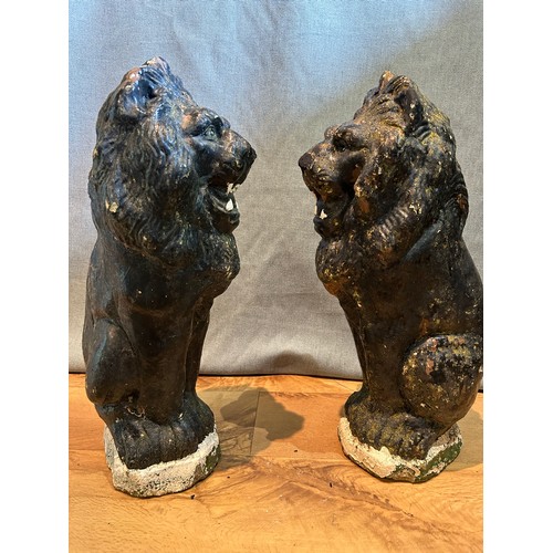 327D - Three vintage & nicely weathered cast stone garden statues including a pair of lions painted black 5... 