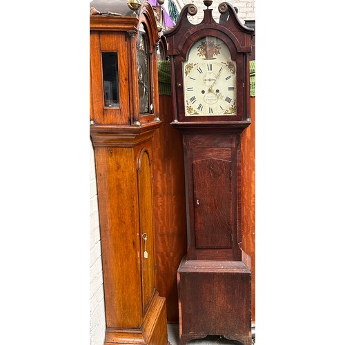 348 - An early 19th Century oak cased Longcase clock by Broderick of Peterborough. The arched dial painted... 