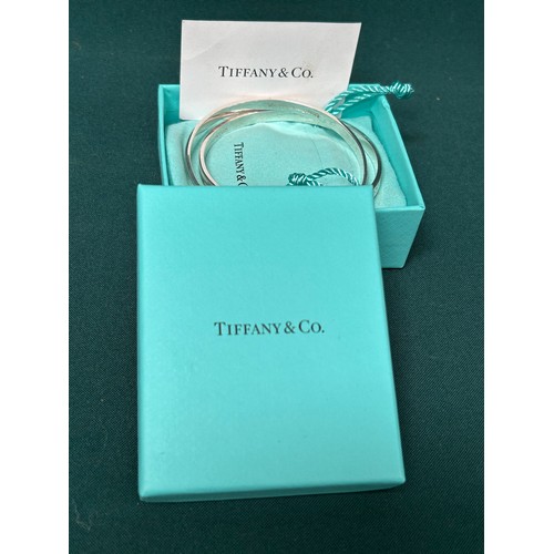 49 - A Tiffany 925 Silver double bound bangle with box - 35 grams
