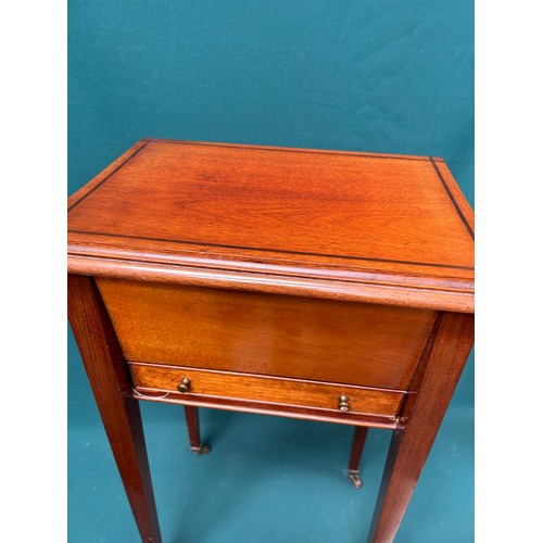 424A - An Edwardian mahogany sewing table on tapered with inlaid banding , lift up lid and drawer and conte... 