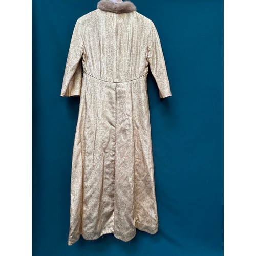 340B - A 1950's or early 60's high hollywood fashion  gold lamé with champagne collar, long evening coat  b... 