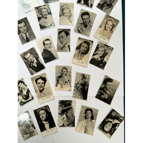 181A - A collection of 30 X 1930's and 40's miniature film star photographs by Rank, Warner Bros, Metro-Gol... 