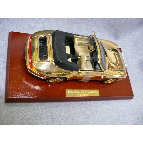 87 - A VERY NICE 22CT GOLD PLATED MODEL OF A PORSCHE 911 CARRERA CABRIOLET ON WOODEN PLINTH
