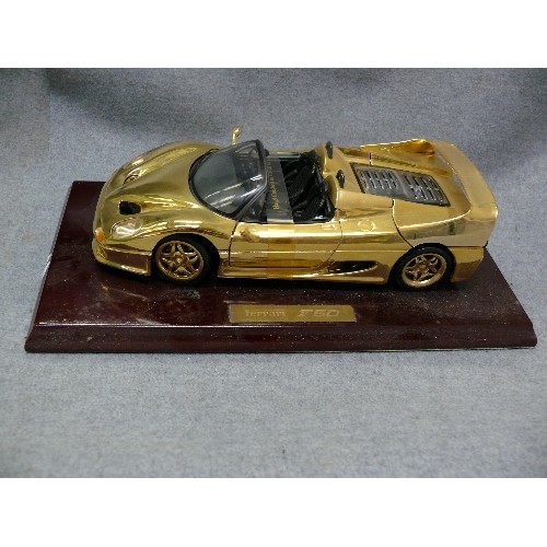 88 - A VERY NICE 22CT GOLD PLATED MODEL OF A FERRARI F50 ON WOODEN PLINTH