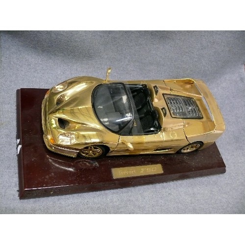 88 - A VERY NICE 22CT GOLD PLATED MODEL OF A FERRARI F50 ON WOODEN PLINTH