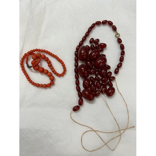 122 - NOTE DURING VIEWING LARGE NECKLACE BEADS HAVE BECOME DETACHED. A beautiful vintage long cherry amber... 