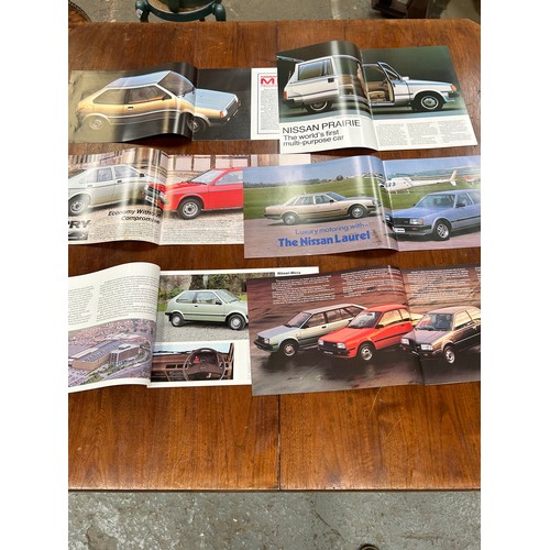 185 - Automobilia Ephemera: Nissan- 6 X Car Brochures including: Cherry 1982; Sunny 1982; Laurel 1983; Pra... 