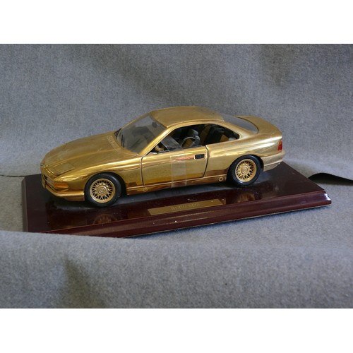 86 - A VERY NICE 22CT GOLD PLATED MODEL OF A BMW 850I ON WOODEN PLINTH