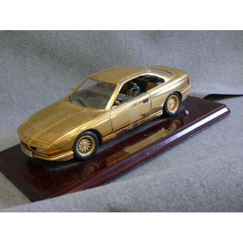 86 - A VERY NICE 22CT GOLD PLATED MODEL OF A BMW 850I ON WOODEN PLINTH