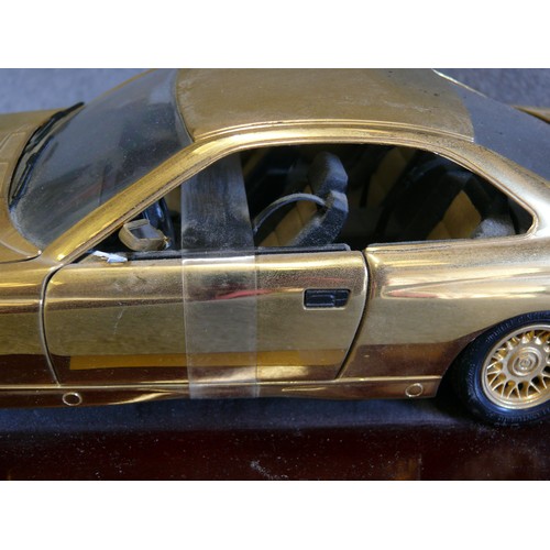 86 - A VERY NICE 22CT GOLD PLATED MODEL OF A BMW 850I ON WOODEN PLINTH