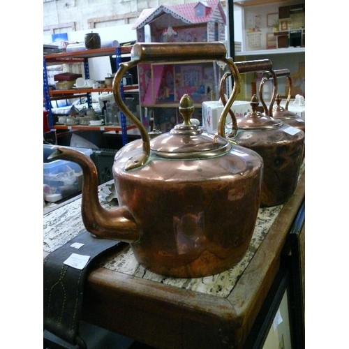 255 - 3 LARGE GRADUATED VINTAGE COPPER KETTLES