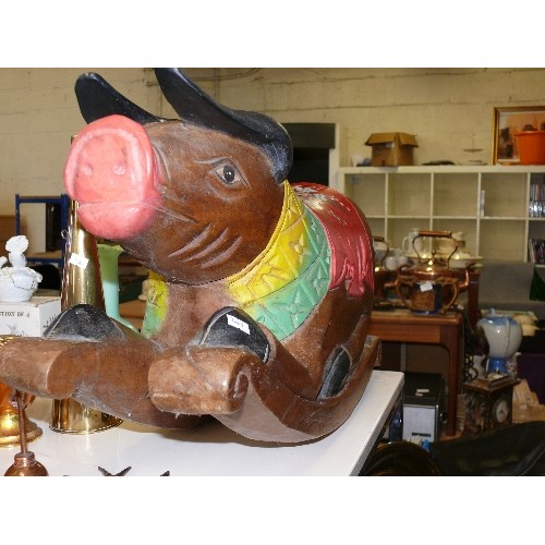 281 - A LOVELY CARVED WOODEN ROCKING PIG