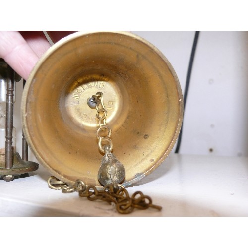 94 - A SMALL WALL MOUNTED BRASS BELL AND A VINTAGE BRASS HOURGLASS EGG TIMER