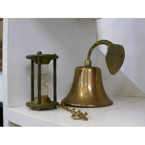 94 - A SMALL WALL MOUNTED BRASS BELL AND A VINTAGE BRASS HOURGLASS EGG TIMER