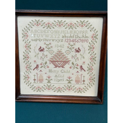 524 - A hand worked copy of a mid 19th Century framed needlework cross stitch sampler -  Hetty Child Aged ... 