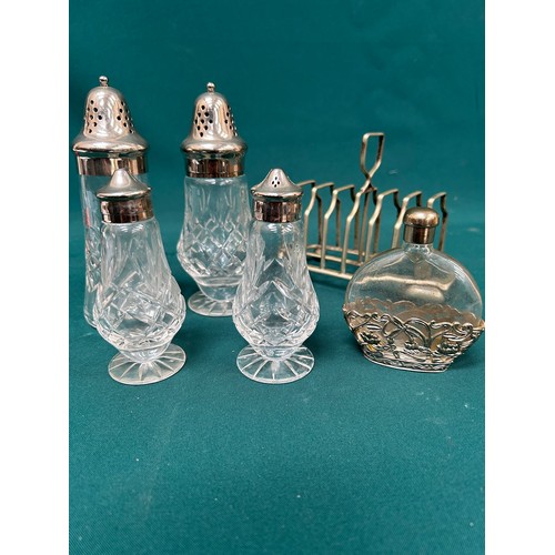 526 - Silver plated items including cut glass salt & pepper, two sugar casters, perfume bottle in stand an... 