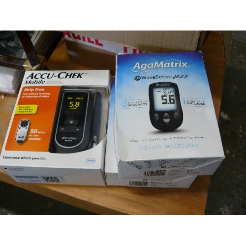 332 - 2 X AGA MATRIC BLOOD GLUCOSE MONITORING SYSTEMS AND AN ACCU-CHECK SYSTEM, ALL BOXED