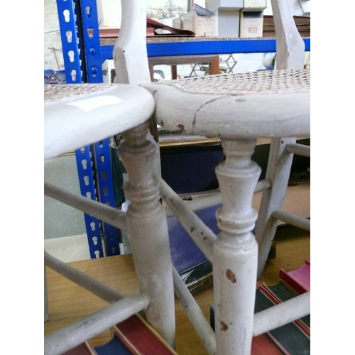 422 - A PAIR OF VINTAGE PAINTED CHAIRS WITH CANE SEATS