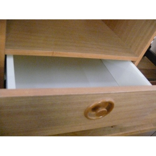 439 - A SMALL 2 DRAWER BEDSIDE ON CASTORS BY SCHREIBER