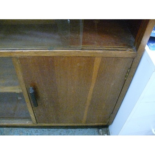 481 - A VINTAGE CABINET WITH GLASS SLIDING DOORS AND CUPBOARD