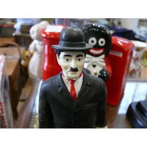 533 - CHARLIE CHAPLIN FIGURE BY LEONARDO AND LAUREL & HARDY ON A BENCH