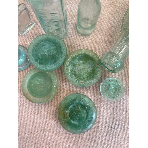 565 - VINTAGE BOTTLES INCLUDING TORPEDO BY STEWARD & PATTESON NORWICH, BOTTLE / JAR TOPS ETC