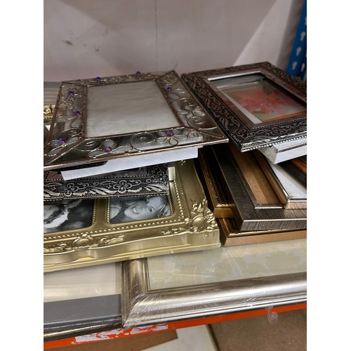 588 - MOSTLY AS NEW PHOTOGRAPH AND PICTURE FRAMES APPROX 18