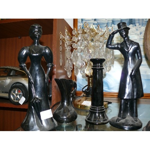 168 - A PAIR OF BLACK CERAMIC FIGURINES PLUS A CANDLESTICK AND A JUG