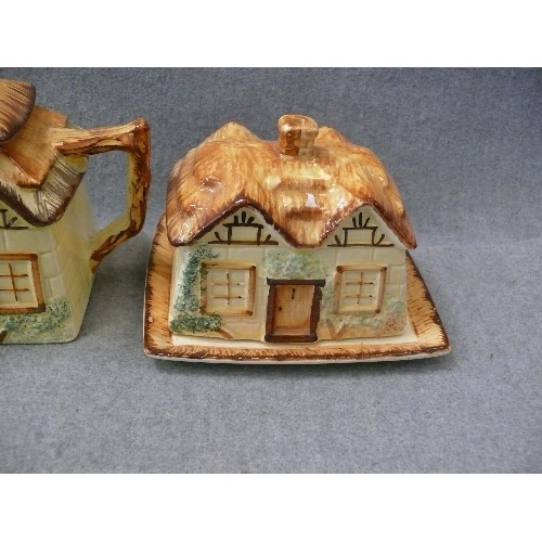 187 - THATCHED COTTAGE CERAMIC TEAPOT, CREAMER AND BUTTER DISH