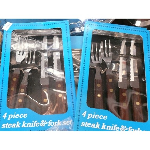 294 - A COLLECTION OF NEW STAINLESS STEEL SERVING SETS PLUS 2 SETS OF STEAK KNIVES AND FORKS ALSO NEW