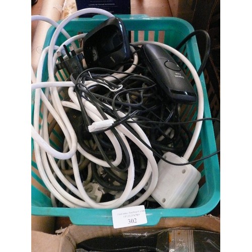 302 - A BASKET OF CABLES AND EXTENSION LEADS