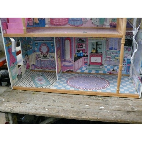 409 - VERY LARGE PINK WOODEN DOLLS HOUSE