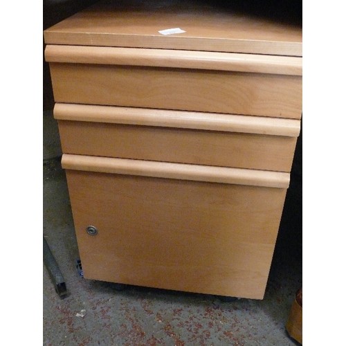 427 - A SMALL BEECH EFFECT FILING CABINET WITH 3 DRAWERS.  CABINET IS LOCKED BUT THERE IS NO KEY.