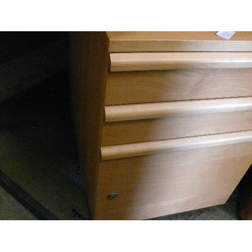 427 - A SMALL BEECH EFFECT FILING CABINET WITH 3 DRAWERS.  CABINET IS LOCKED BUT THERE IS NO KEY.