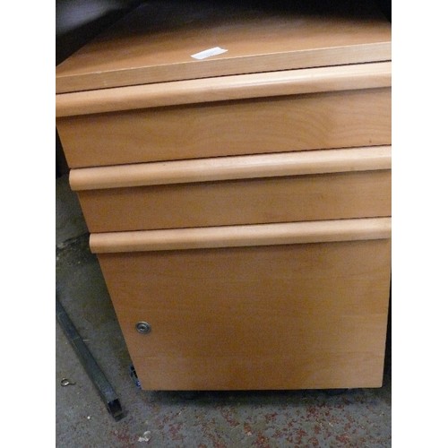 427 - A SMALL BEECH EFFECT FILING CABINET WITH 3 DRAWERS.  CABINET IS LOCKED BUT THERE IS NO KEY.