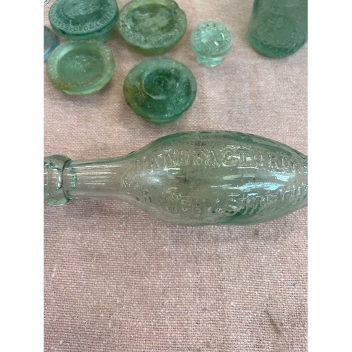 565 - VINTAGE BOTTLES INCLUDING TORPEDO BY STEWARD & PATTESON NORWICH, BOTTLE / JAR TOPS ETC