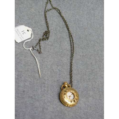 31 - A LADIES HALF HUNTER FOB WATCH ON A CHAIN