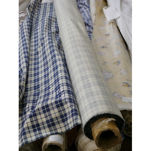 424 - A ROLL OF BLUE GINGHAM FABRIC