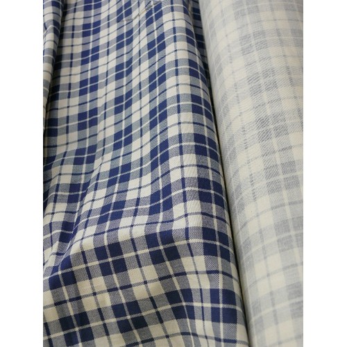 424 - A ROLL OF BLUE GINGHAM FABRIC