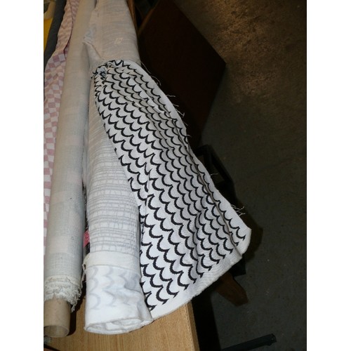 425 - A ROLL OF 2 DIFFERENT DESIGN FABRICS, BOTH BLACK & WHITE PSYCHEDELIC