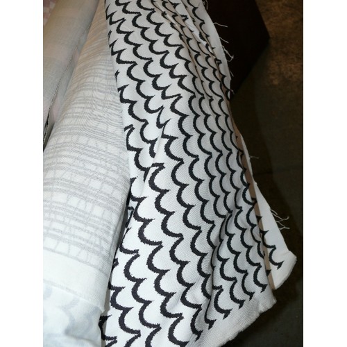 425 - A ROLL OF 2 DIFFERENT DESIGN FABRICS, BOTH BLACK & WHITE PSYCHEDELIC