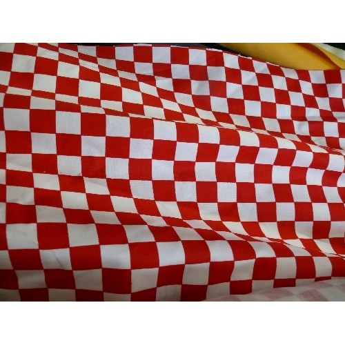 427 - A ROLL OF RED AND WHITE CHECK FABRIC