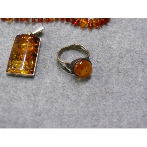 48 - THREE PIECES OF LOVELY AMBER - AN ART DECO SILVER RING, A BRACELET MADE OF BEADS OF AMBER AND A PEND... 