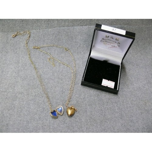 42 - 2 9CT GOLD HEART SHAPED PENDANTS ON GOLD CHAINS WEIGHT 6.48GR