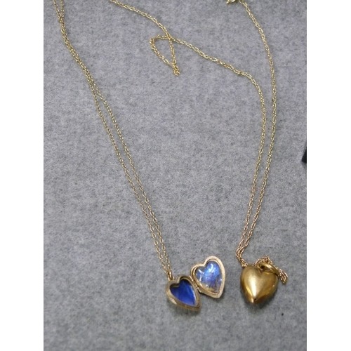 42 - 2 9CT GOLD HEART SHAPED PENDANTS ON GOLD CHAINS WEIGHT 6.48GR