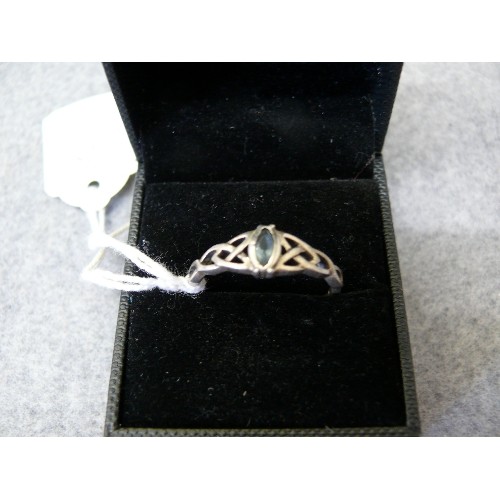 32 - A LOVELY SILVER CELTISH RING WITH A PALE BLUE STONE