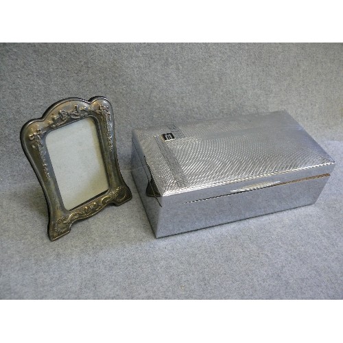 57 - A LARGE CHROME PLATED CIGARETTE BOX PLUS SILVER PLATE PHOTO FRAME